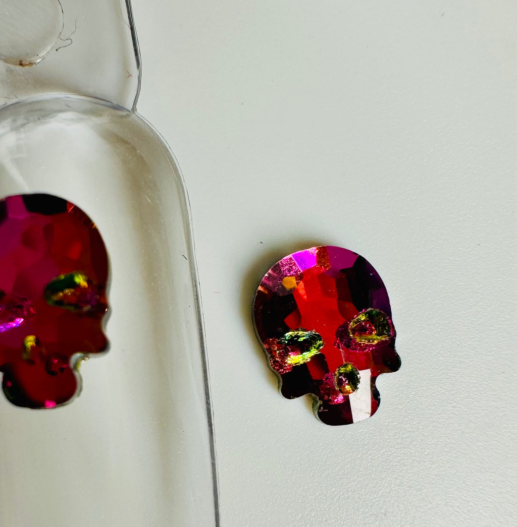 Pink/green crystal skulls
