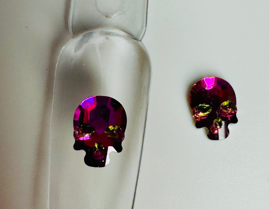 Pink/green crystal skulls